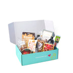Bier en snacks geschenkpakket netjes verpakt in de open cadeaudoos