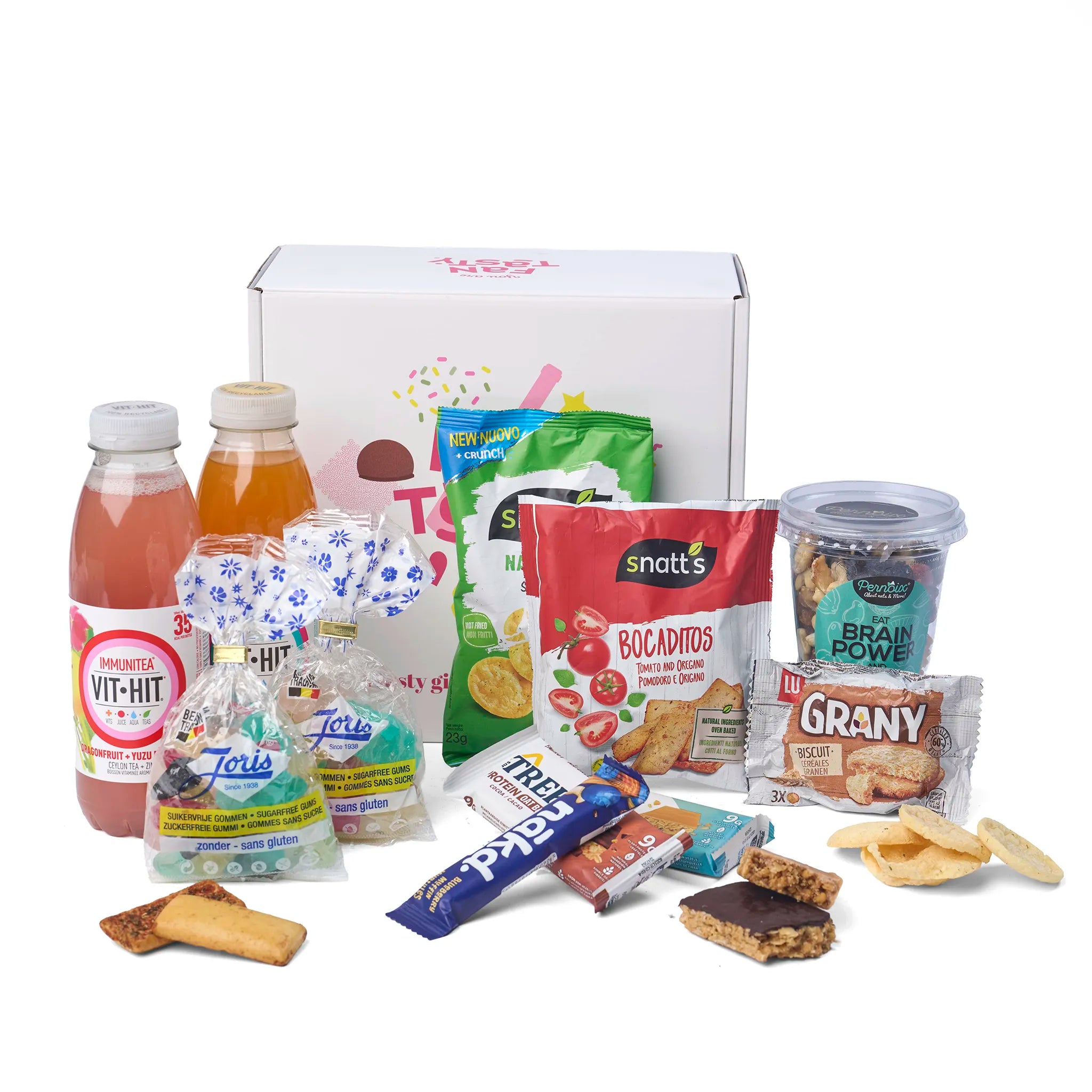 Sfeerbeeld van het Geschenk Feel Good met losse snacks en suikervrij snoepgoed naast de doos