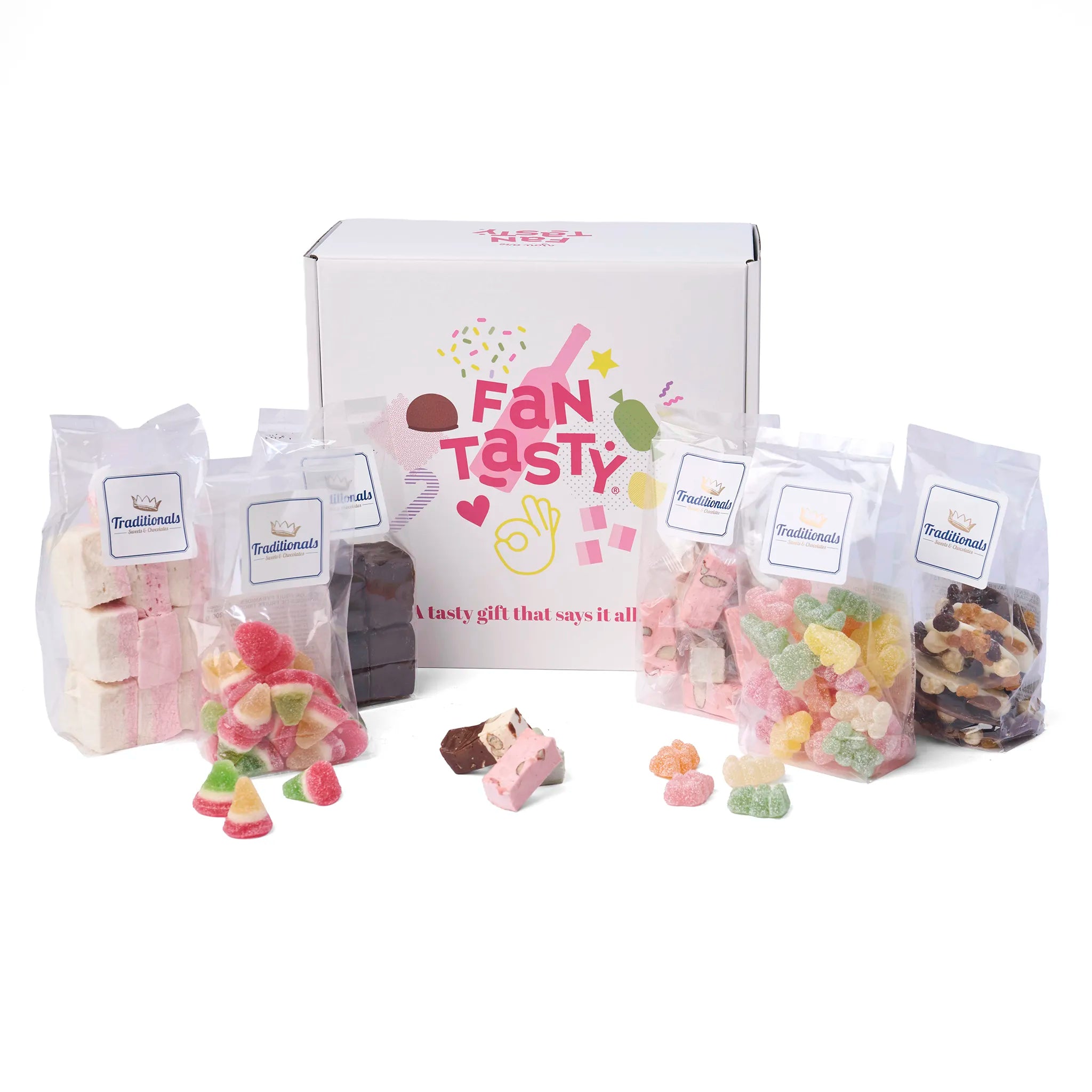 Sfeerbeeld van het Geschenk Traditionals Belgische Smaaksensaties met los snoepgoed en nougat naast de doos