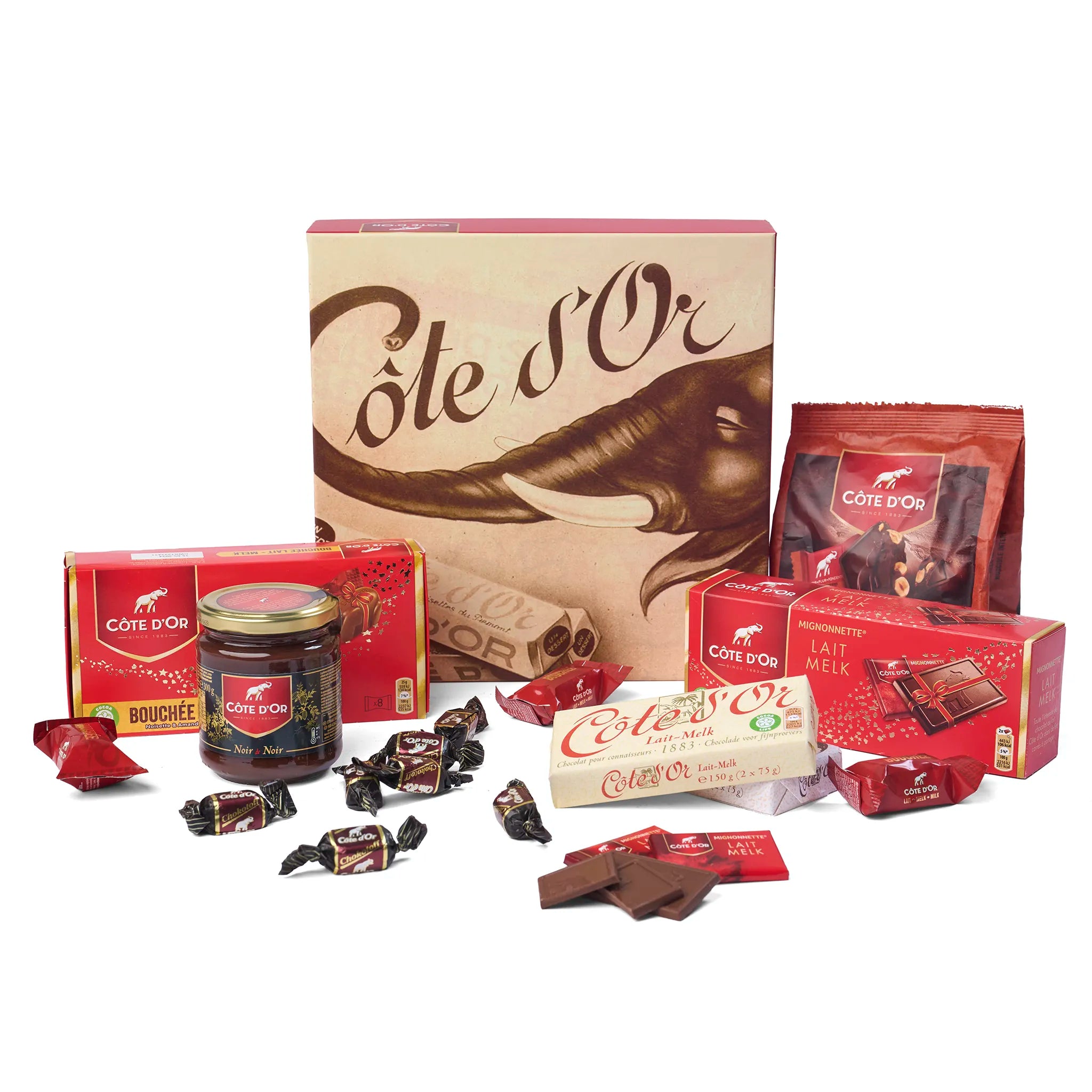 Sfeerbeeld van het Geschenk Luxe Côte d’Or met losse chocolade naast de doos